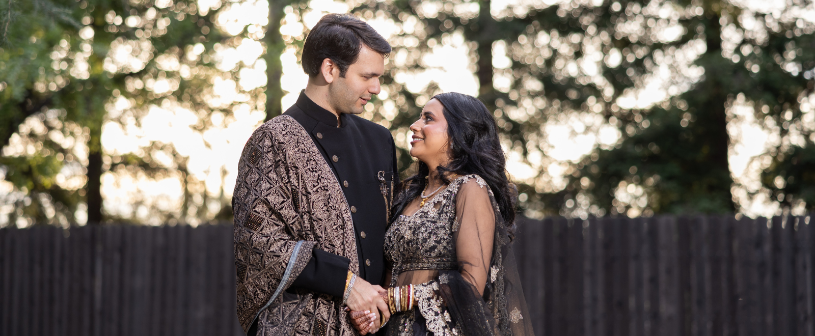 Ashmi and Umang grand wedding reception portrait at The Palms with elegant evening decor and cinematic lighting